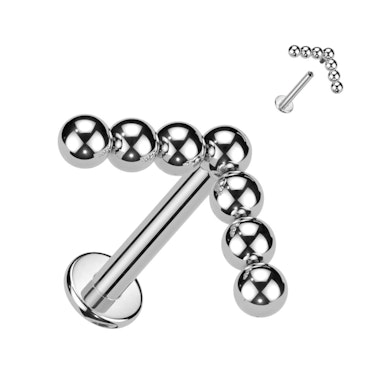 Titaniumlabret med chevrontop af kugler