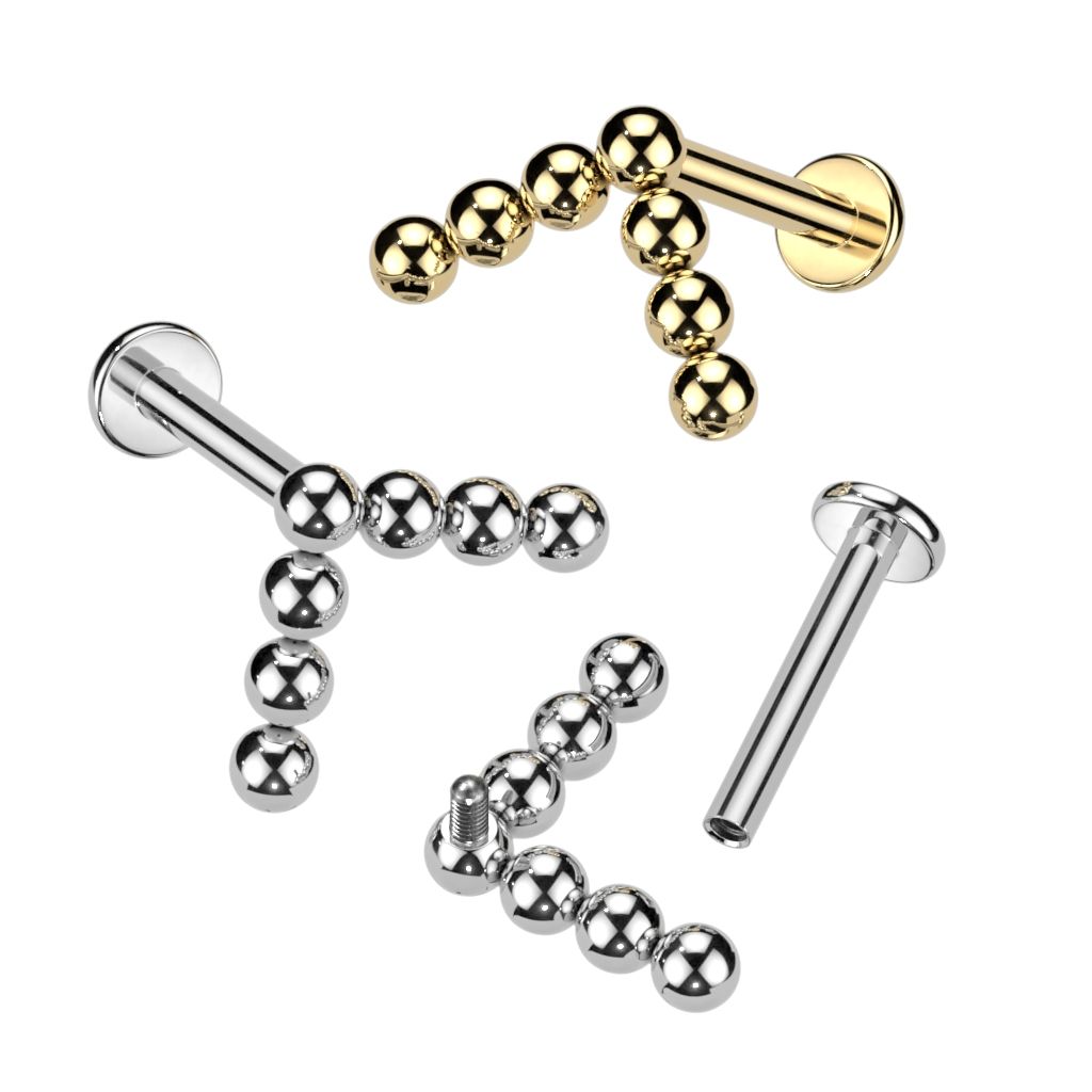 Titaniumlabret med chevrontop af kugler
