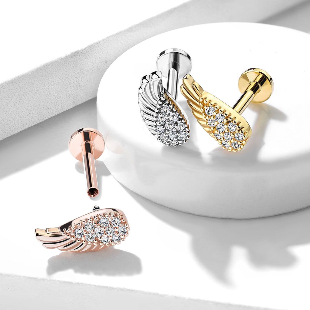 Labret med form som englevinge og masser af sten
