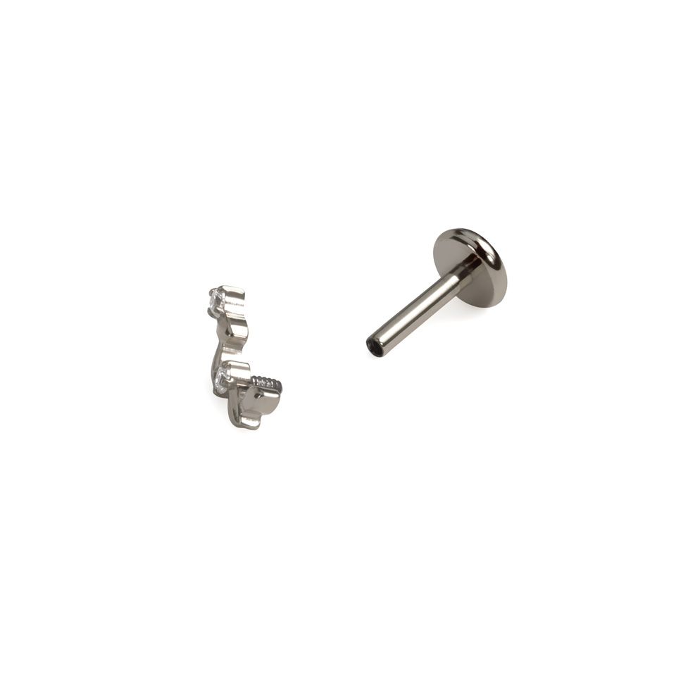 Titaniumlabret med buet design af blade og sten