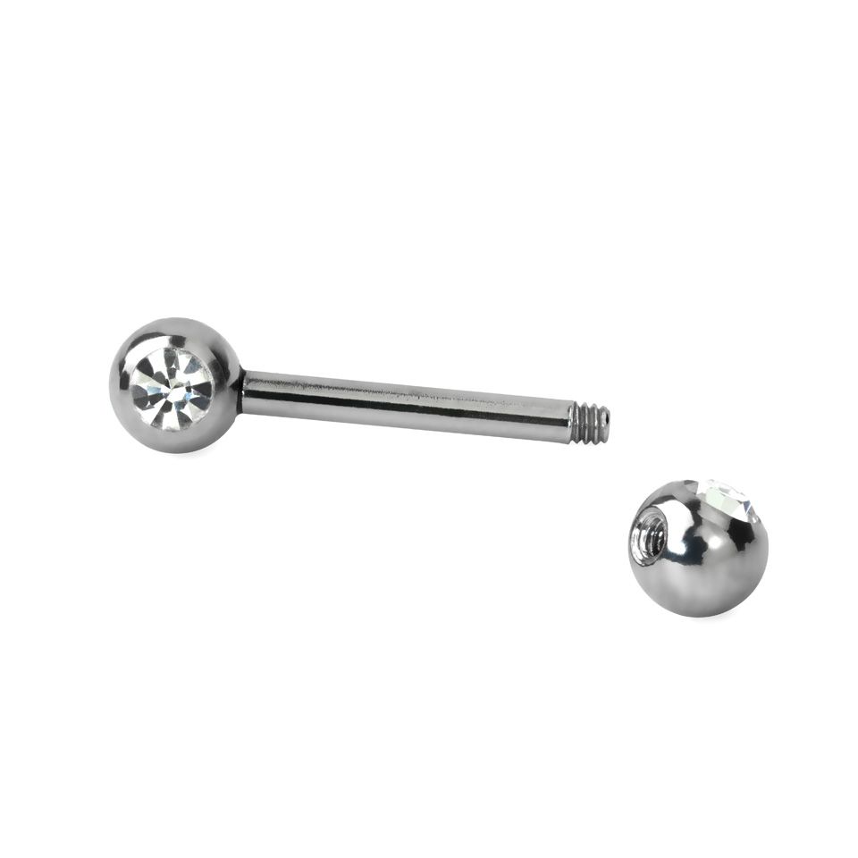 Brystpiercing med sten i flere farver