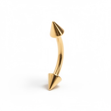 Guldbelagt buet stav med spikes