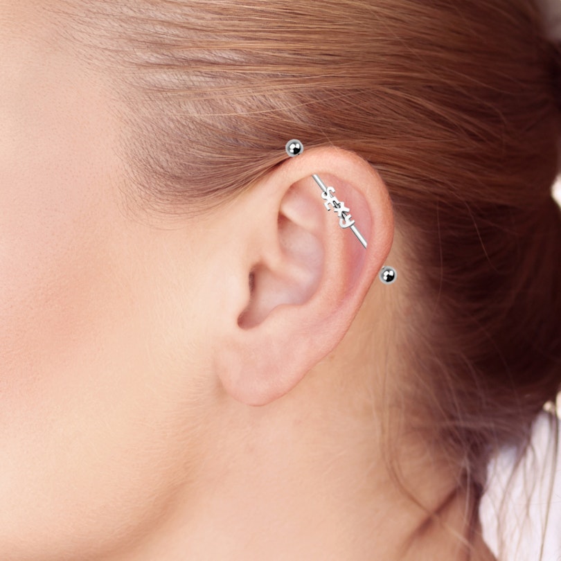 Industrial stav med tekst Piercing - Danmark
