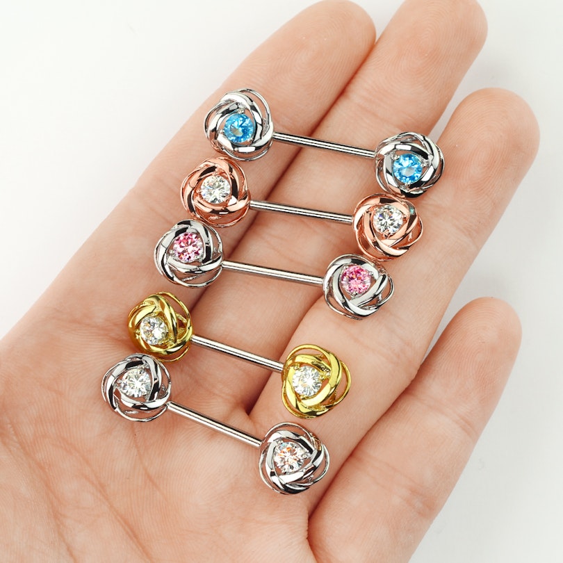 Brystpiercing med sten i rose Piercing - Danmark