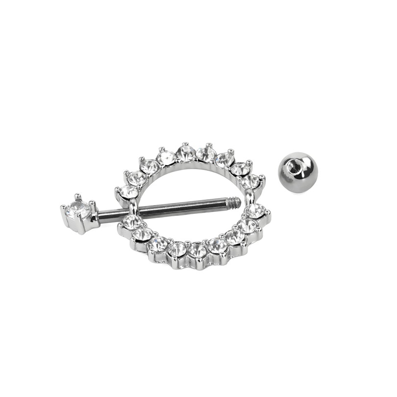 Brystpiercing med rundt skjold og klare sten Piercinger - Danmark