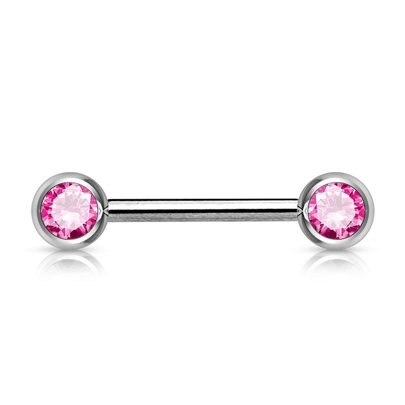 Brystpiercing med sten i flere farver. Piercinger - Danmark