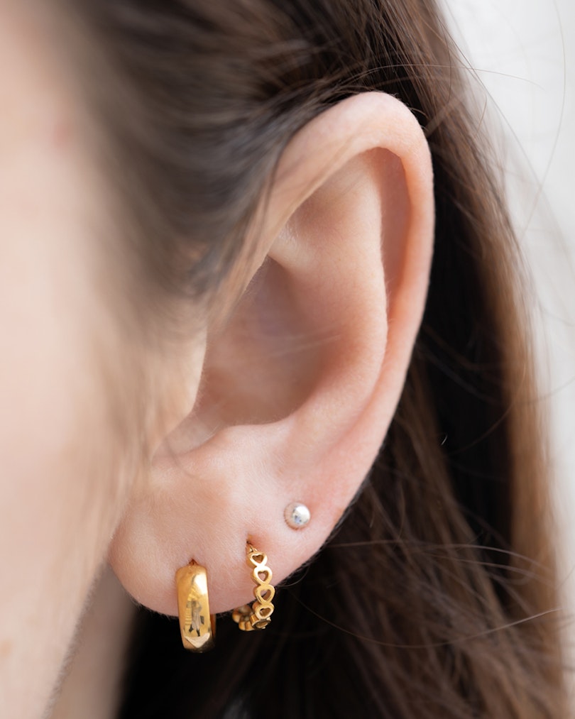 Hængslet segmentring med hjerter Kropspiercing - Danmark