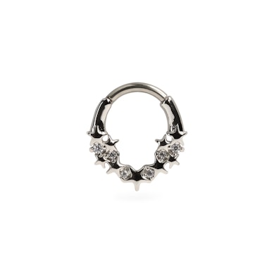 Udadvendt ring med stjerner og sten