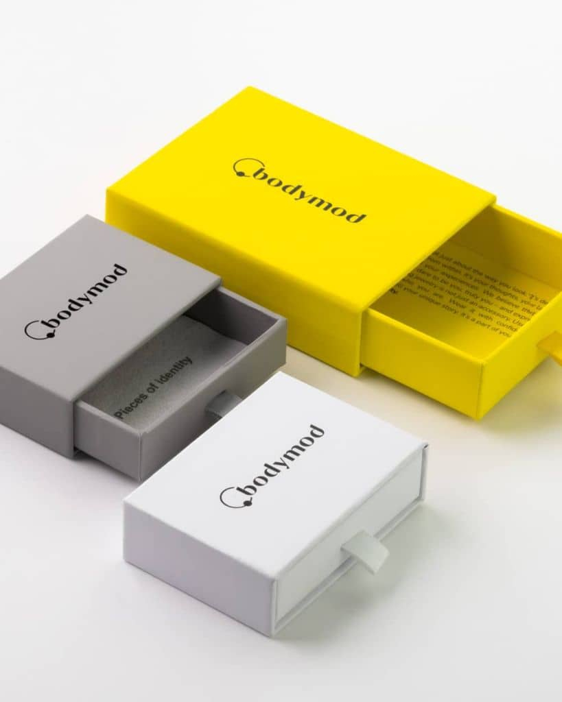 Navlepiercing med marmorstruktur Kropspiercing - Danmark