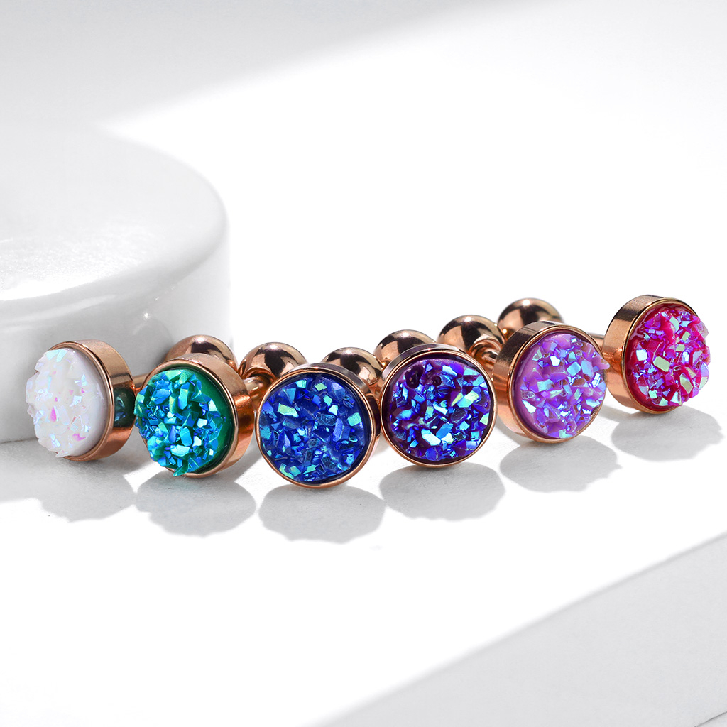 Ørepiercing med druzy sten