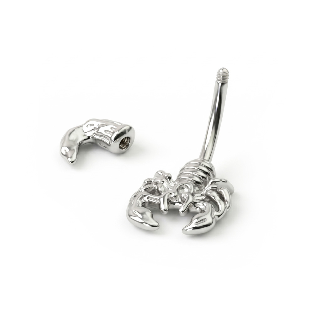 Navlepiercing med skorpion