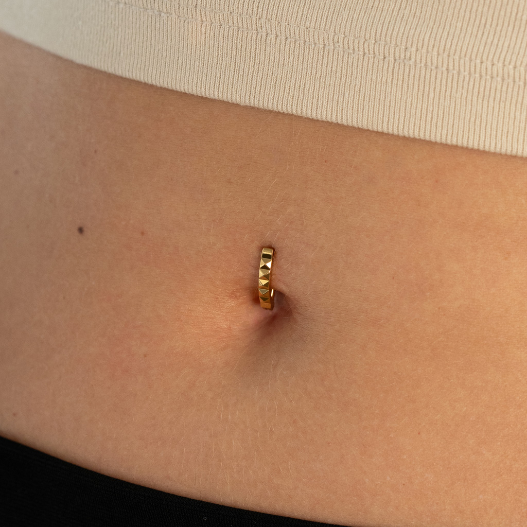 Navle-clicker af titanium med facetter