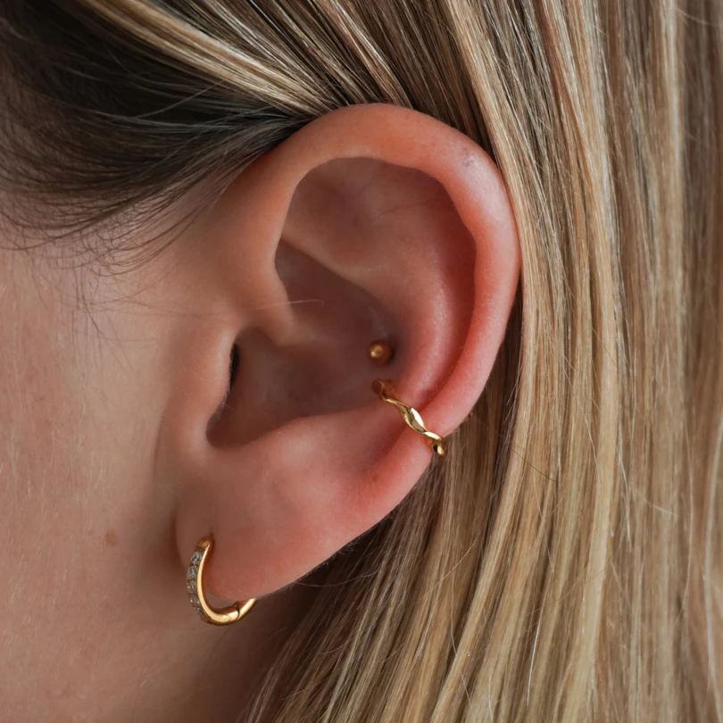 Minimalist twist ear cuff