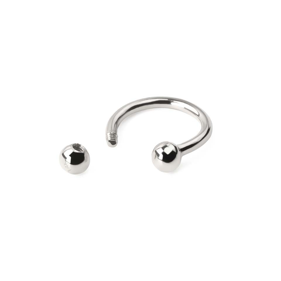 Hestesko af 14 karat guld