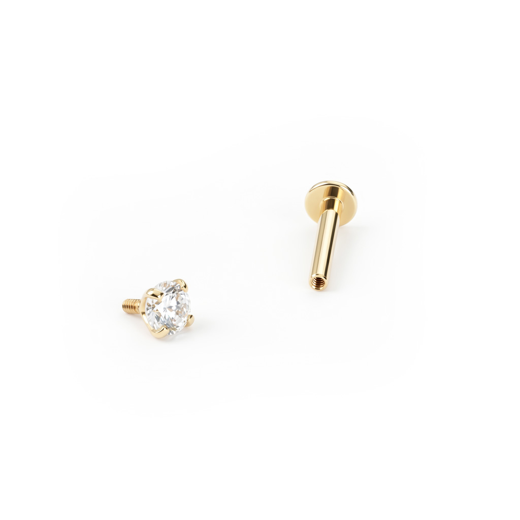 Labret af 14 karat guld med indvendigt gevind og sten