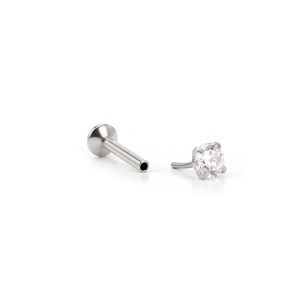 Push-in-labret med sten i tandfatning