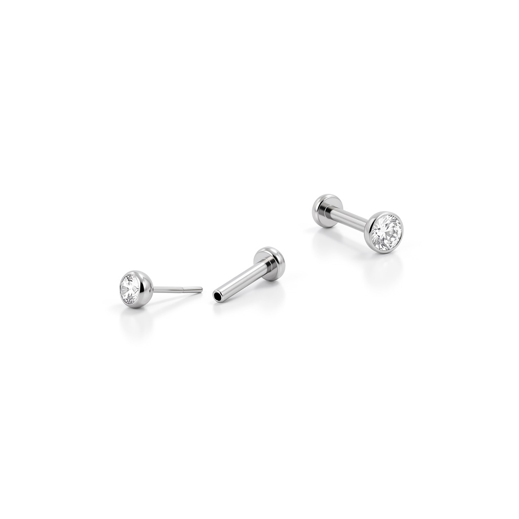 Push-in labret i titanium med indfattet sten