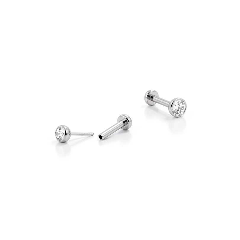 Push-in labret i titanium med indfattet sten
