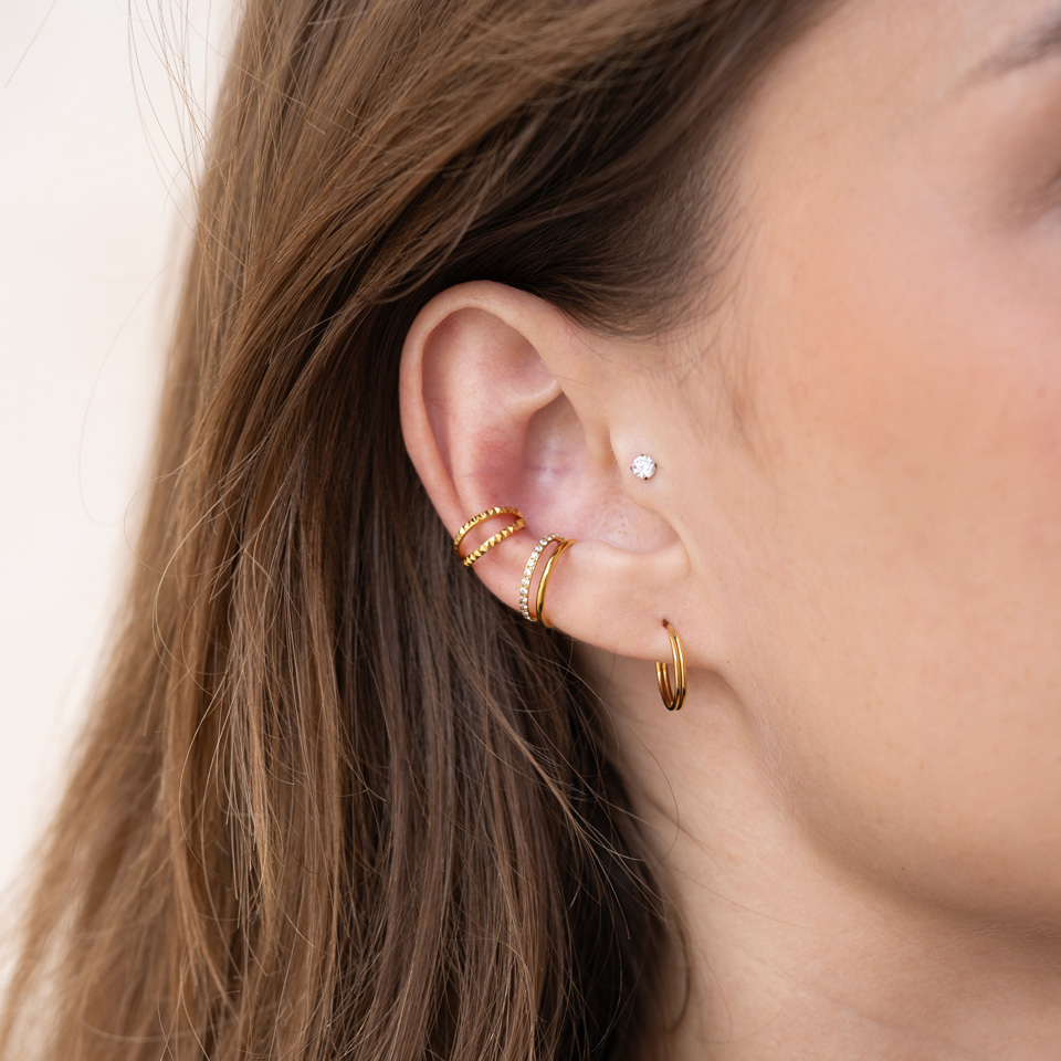 Push-in labret af titanium med sten i grabbefatning