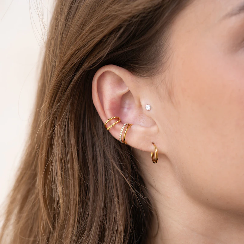 Push-in labret af titanium med sten i grabbefatning