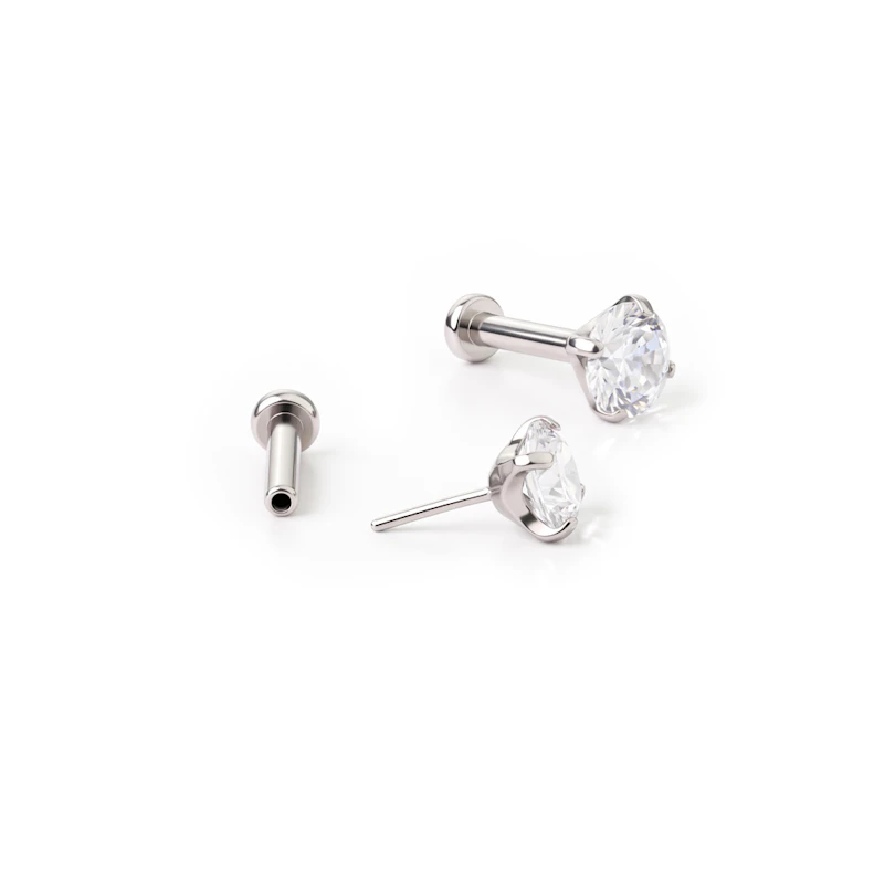 Push-in labret af titanium med sten i grabbefatning