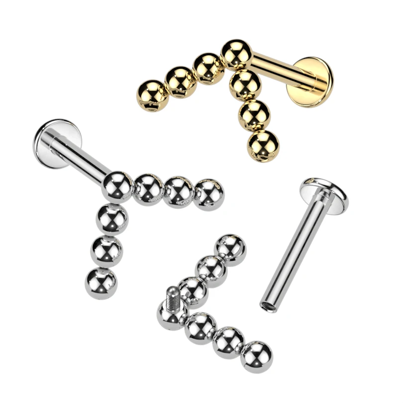 Titaniumlabret med chevrontop af kugler