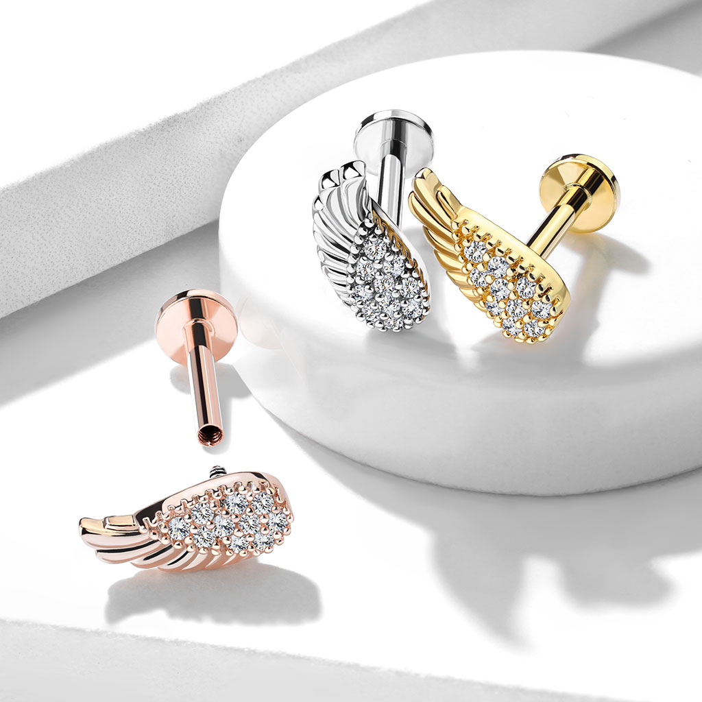 Labret med form som englevinge og masser af sten