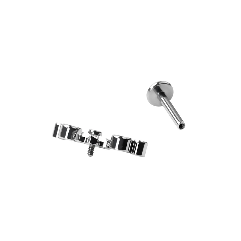 Titaniumlabret med blomst og sten