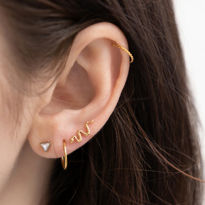 Push-in labret af titanium med slange