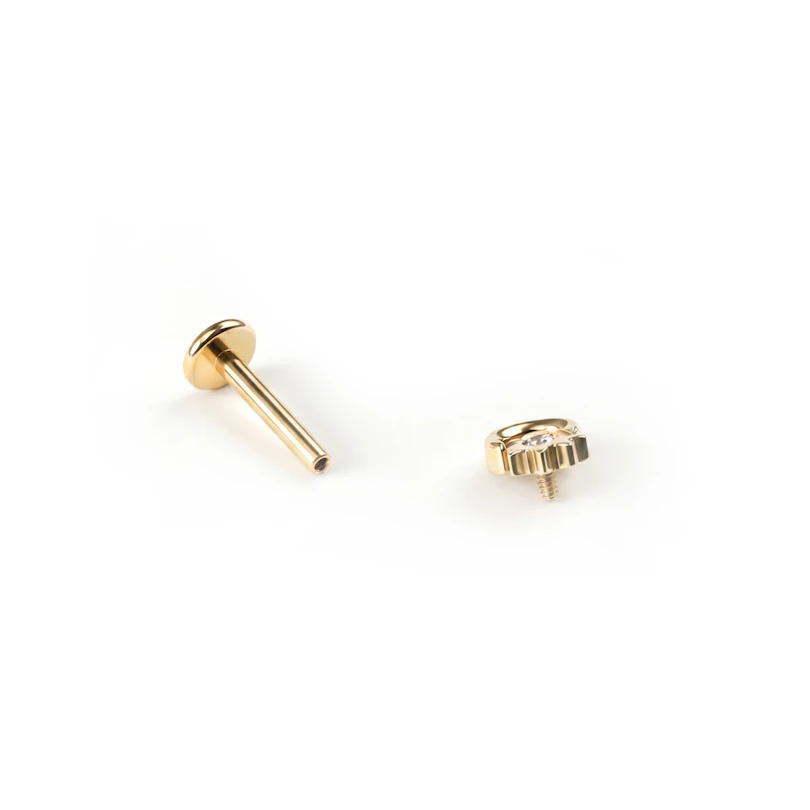 Titaniumlabret med sol og måne