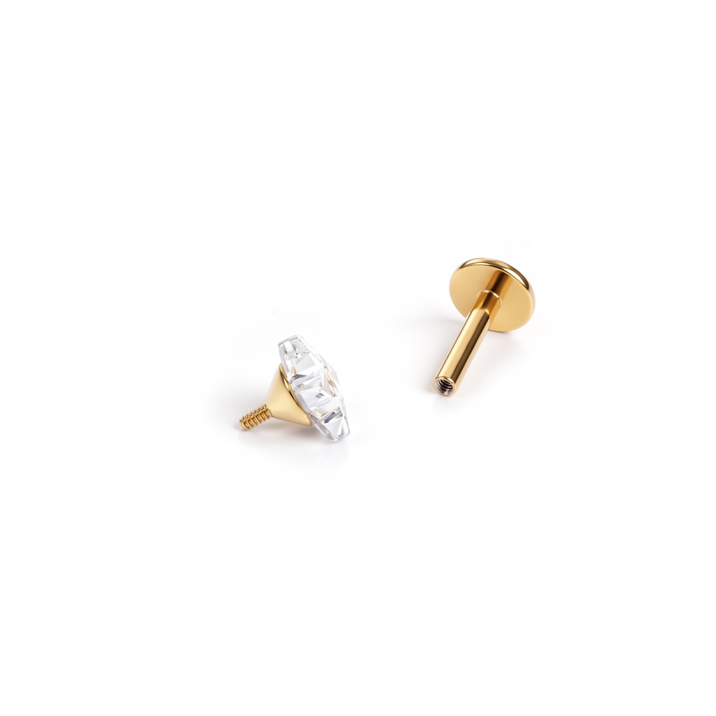 Labret med stjerneformet sten