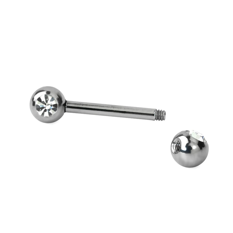 Brystpiercing med sten i flere farver