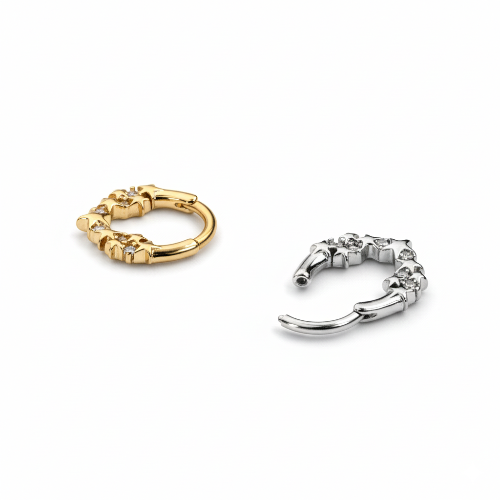 Udadvendt ring med stjerner og sten