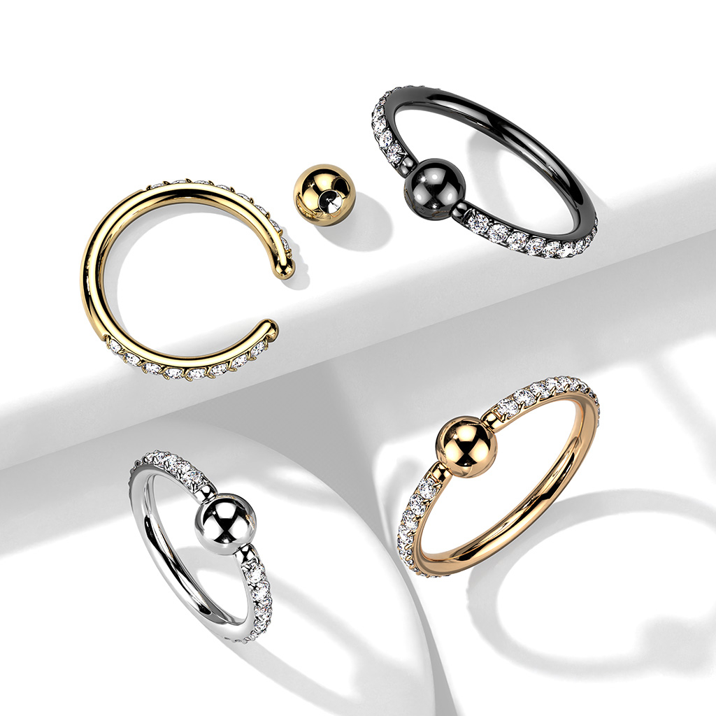 Kuglering af titanium med sten på hver side